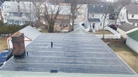 flat roof contractors near me.